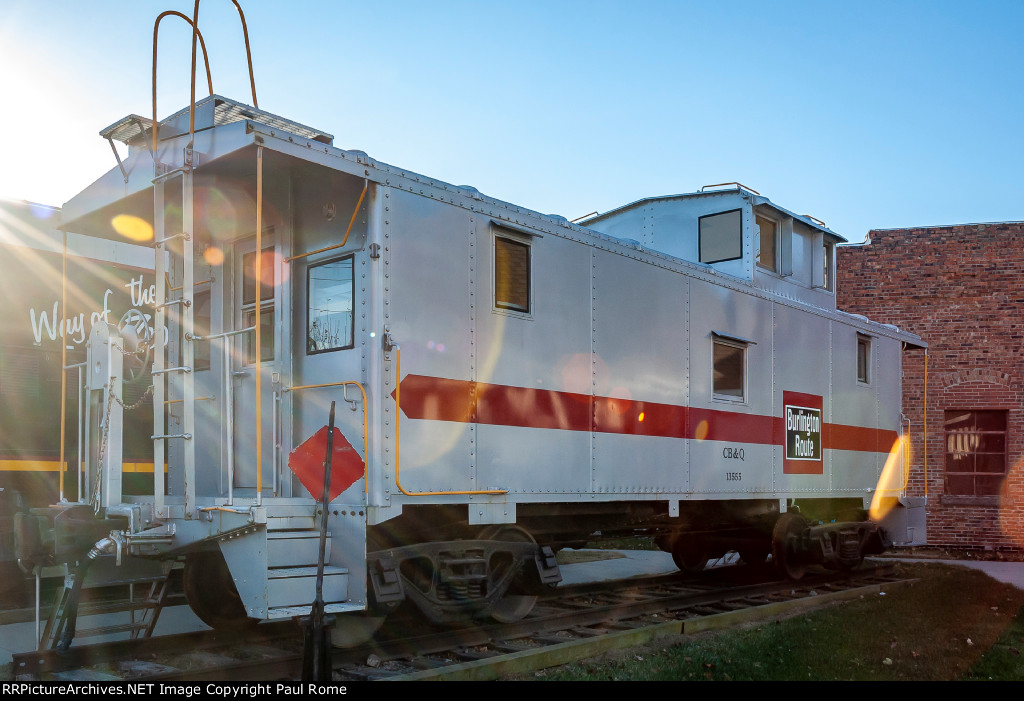 CBQ 13555 wearing fresh paint and lettered for CB&Q this ex EJ&E caboose is on display at the Monroe County Historical Society 